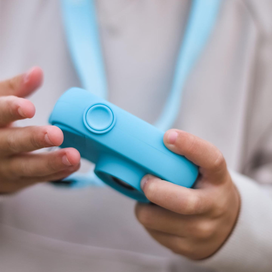 boy holding myfirst camera for kids blue