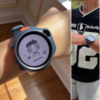 myFirst Fone R2 dark navy kids smartwatch worn on a child's wrist, displaying a customized welcome screen with a cartoon avatar.
